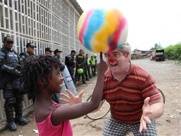 Clown performs in front of police in Colombia
