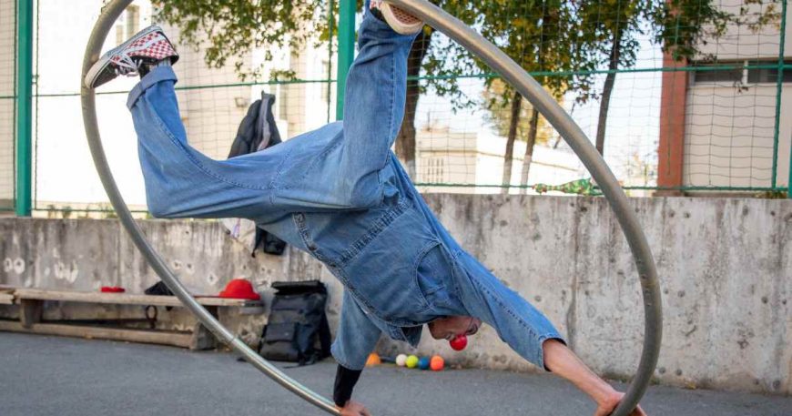 Clown performing a hoop trick