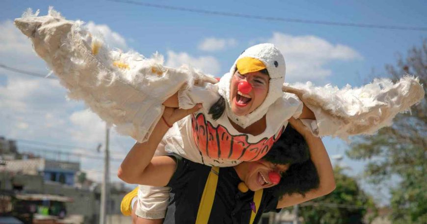 CWB Artists Darina Robles, aka the migrant chicken, and Lars Uribe perform in a CWB tour in Gualemala.
