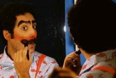 Clown applying makeup