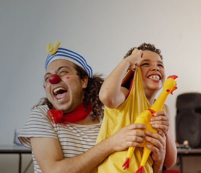 CWB USA clown with kid and rubber chicken