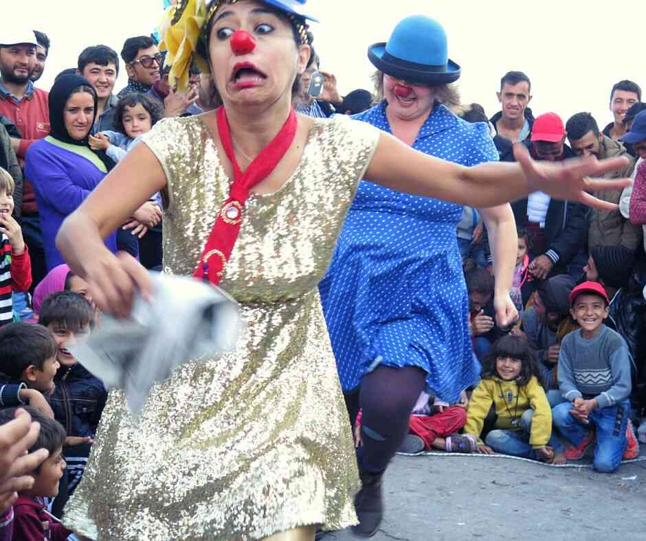 Clowns running and getting laughter in Greece